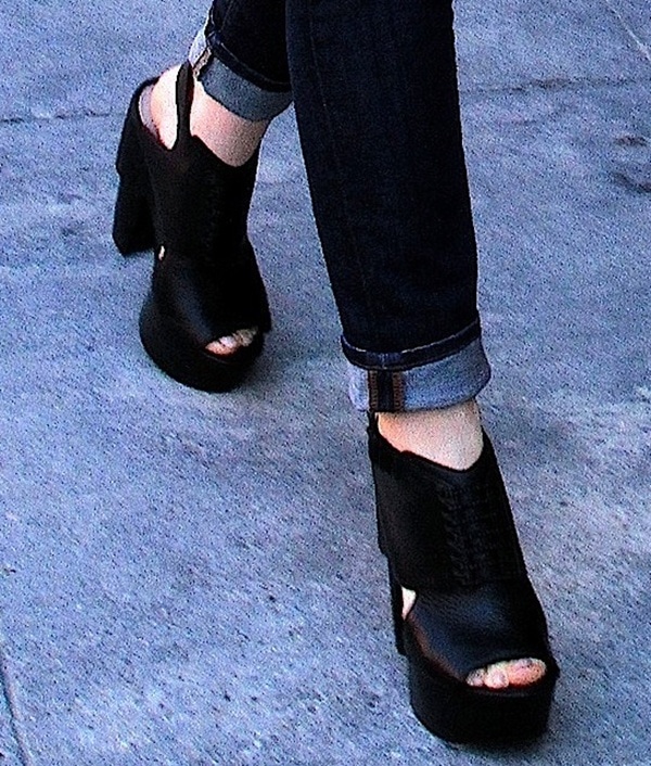 Lily Collins wearing edgy Koolaburra "Zinda" clogs