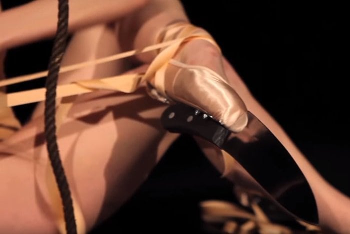 Ballerina shoes extended by a set of sharp kitchen knives