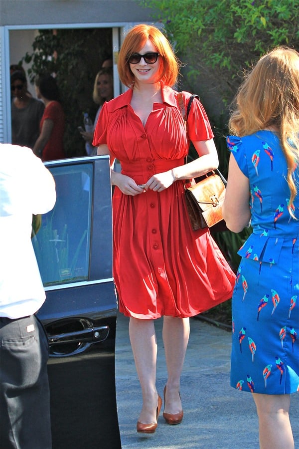 Christina Hendricks dazzles in a figure-hugging red dress at a high-profile party in Brentwood