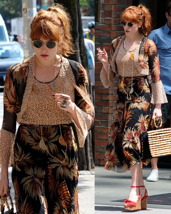 Florence Welch embraces bohemian chic in a patterned two-piece outfit, paired with red Charlotte Olympia wedges and a woven bamboo bag, while strolling through Manhattan