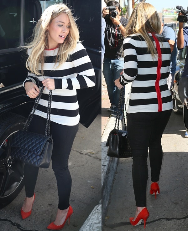 Hilary Duff gives the same Brian Atwood Cassandra pumps a more casual spin, pairing the vivid red heels with black skinny jeans, a striped sweater, and a classic Chanel flap bag during a lunch outing in Los Angeles