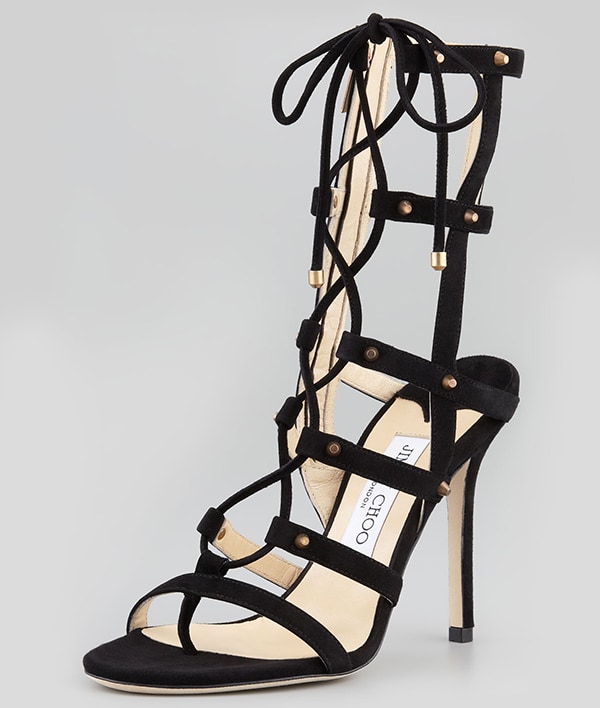 Scintillating architecture dominates a towering suede sandal laced with corset chic