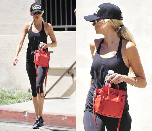 Kimberly Stewart showcasing her fit physique while heading to a gym session in Los Angeles, carrying a striking red Celine Nano handbag on August 6, 2013