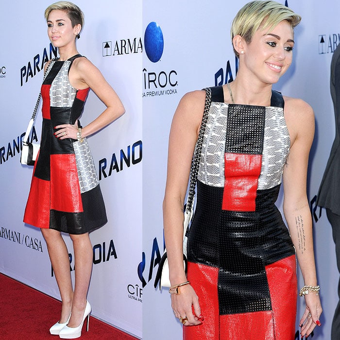 Miley Cyrus made a bold statement at the Paranoia premiere in a patchwork Proenza Schouler dress crafted from whipsnake-embossed and perforated leather