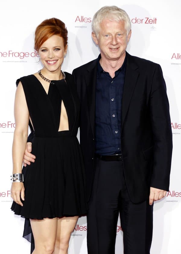 An intimate moment captured between Rachel McAdams and director Richard Curtis at the 'About Time' premiere