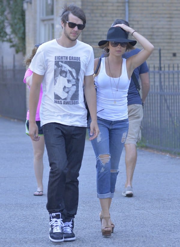 Sarah Hyland, star of Modern Family, walks hand-in-hand with boyfriend Matt Prokop through Manhattan on August 24, 2013