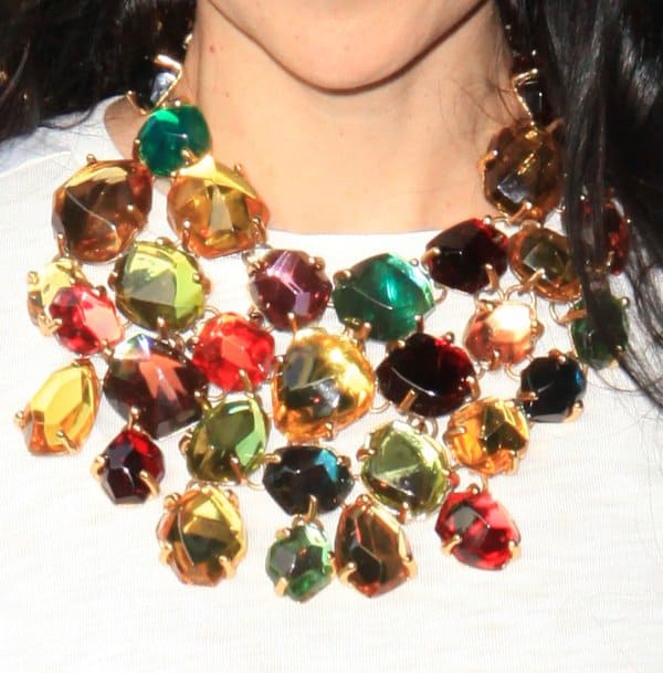 Close-up of Stacey Bendet's striking multicolored stone bib necklace, a true statement piece