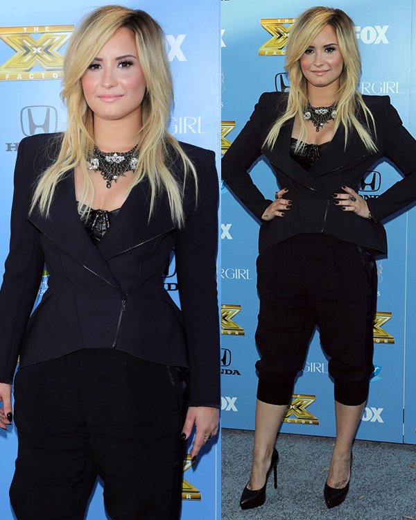 Returning judge Demi Lovato arrives at The X Factor Season 3 premiere party on September 5, 2013, in a sleek black ensemble, complemented by her classic Saint Laurent "Janis" pumps