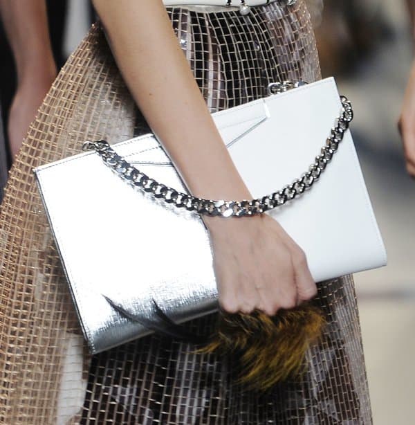 Fendi's modern metallic clutch with chain straps and fur detail, as seen at Milan Fashion Week Spring/Summer 2014