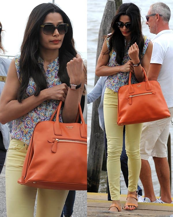 Freida Pinto leaving Venice, Italy, in canary yellow jeans by Citizens of Humanity and a printed top by Zadig Voltaire