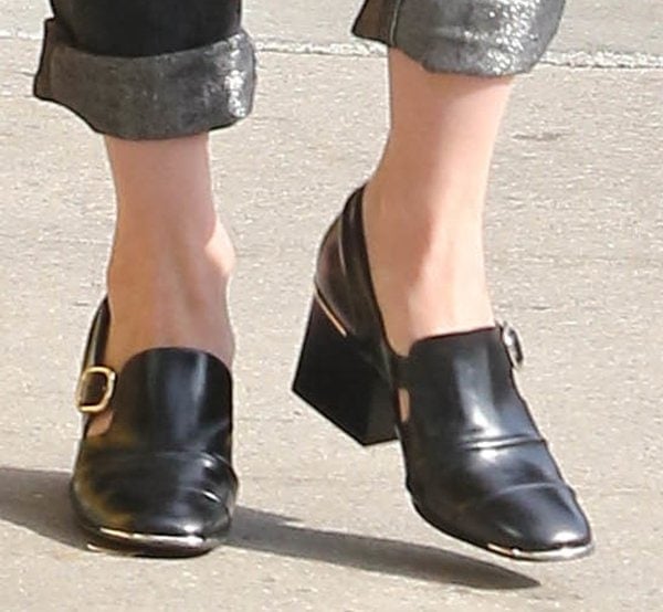 January Jones wearing black leather Balenciaga loafers