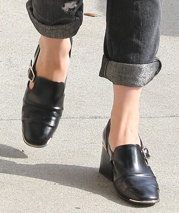January Jones wearing black leather Balenciaga Cube loafers