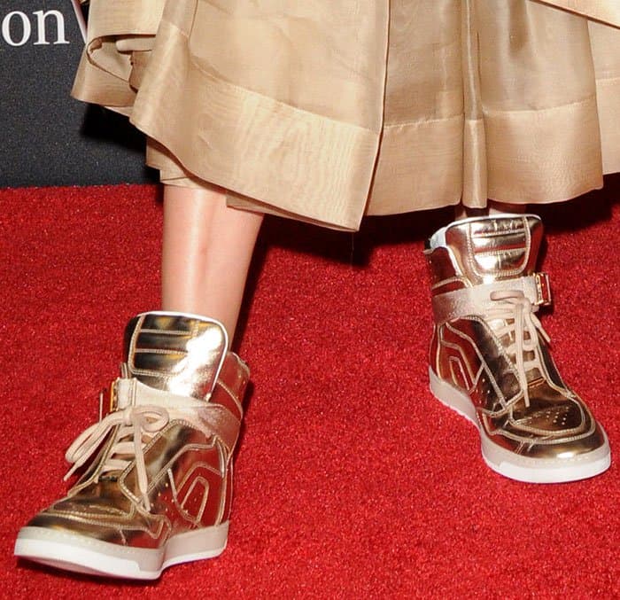Julie Macklowe's metallic gold high-top sneakers stole the show at the 10th Annual Style Awards