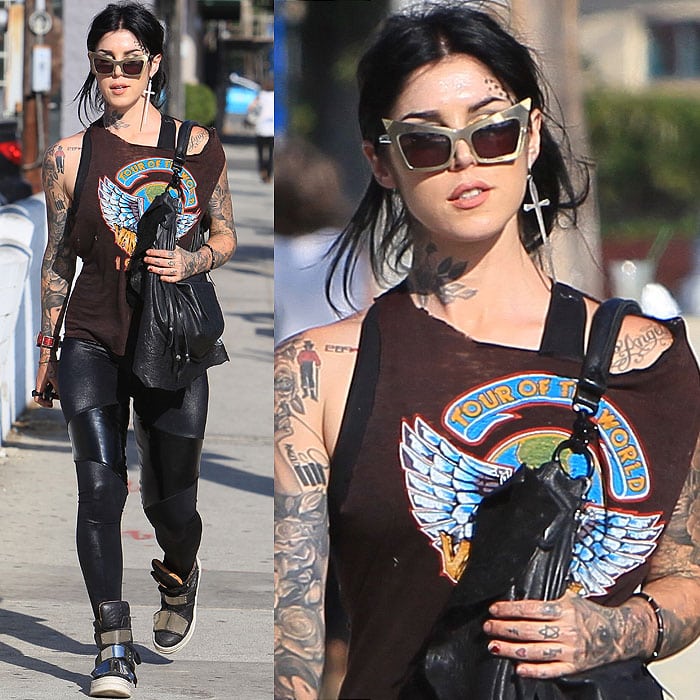 Channel Kat Von D’s effortlessly edgy style by pairing a vintage band tee with black leather leggings, high-top sneakers, and bold accessories like oversized sunglasses and a slouchy crossbody bag for a cool, casual look