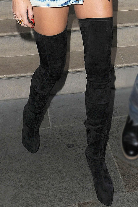 A closer look at Miley Cyrus’ Christian Louboutin “Monicarina” boots reveals the signature second-skin suede shaft set atop a towering 160mm stiletto with a concealed platform for dramatic height