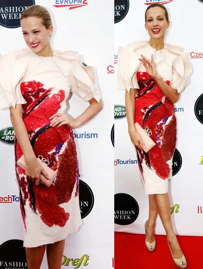Petra Němcová dazzles at Prague Fashion Week in a cream Bottega Veneta Fall 2013 dress with bold red and black appliqué, paired with a nude clutch and peep-toe pumps