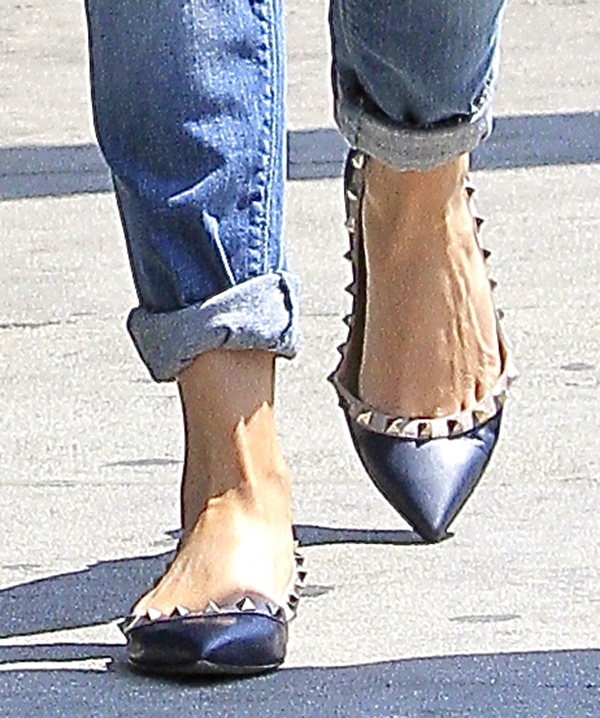 Effortless Elegance: Reese Witherspoon steps out in Valentino Rockstud ballerina flats, combining comfort with luxury in her everyday look