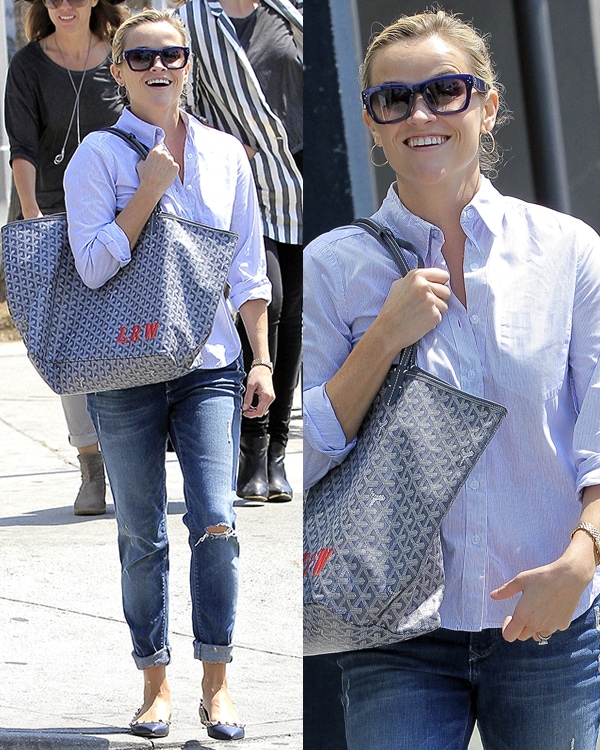Reese Witherspoon embraced a chic, casual look on September 10, 2013, in Los Angeles, pairing her navy Celine sunglasses with a Goyard tote, Black Orchid skinny jeans, Valentino Rockstud flats, and a Hermes Cape Cod watch