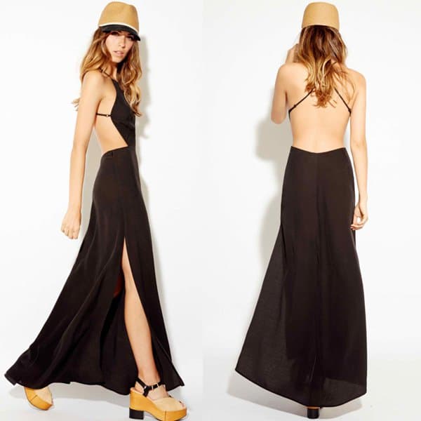 Reformation “Charles” backless maxi dress in black with dramatic side slits and a fluid, minimalist silhouette, originally retailing for $198