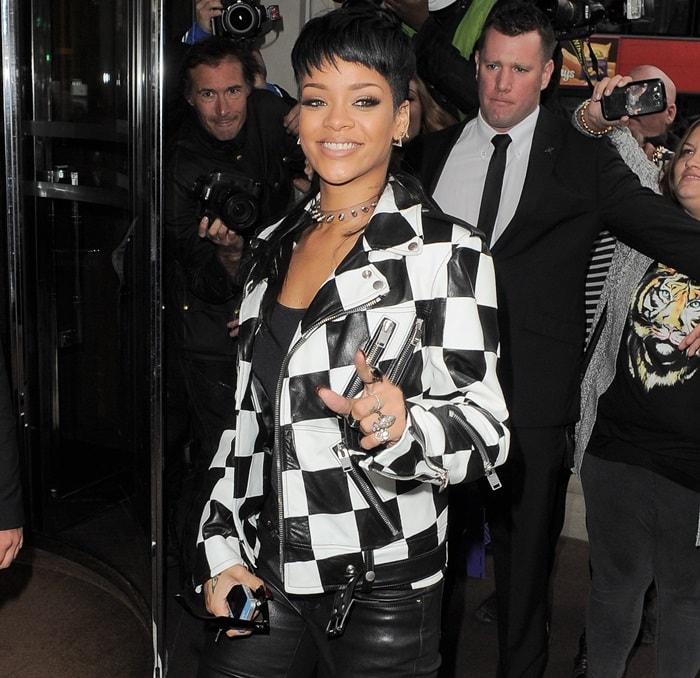 Rihanna exudes chic style in a checkered Saint Laurent jacket as she returns to her hotel