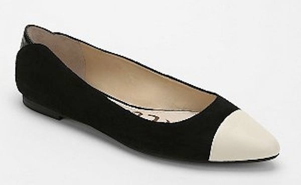 Snake-stamped leather lends shimmery, sculptural charm to an effortless flat