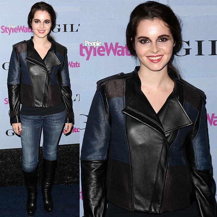 Vanessa Marano showcases a bold patchwork leather jacket in shades of black and navy, paired with fitted blue jeans and knee-high black boots