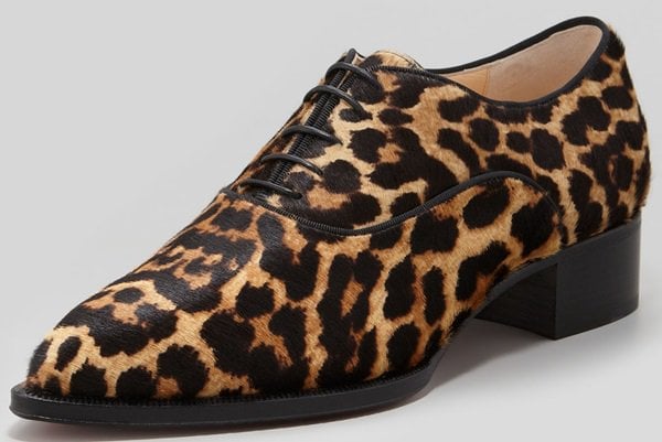 Christian Louboutin Zazou pointed-toe Derby flats in leopard-print calf hair balance sharp menswear tailoring with a bold, tactile finish, grounded by a low stacked heel that adds polish without sacrificing edge