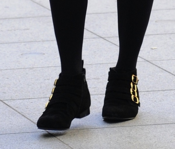 Fearne Cotton showcases her edgy style in black ankle boots with multiple gold buckles