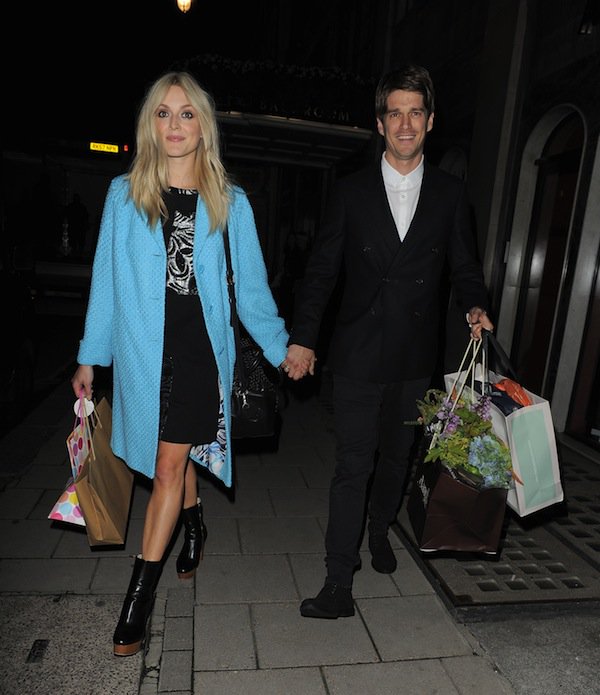 Fearne Cotton (with husband Jesse Wood) in a chic blue coat, a short black dress, and a pair of Stella McCartney faux-leather boots happily leaving the Claridges hotel in London