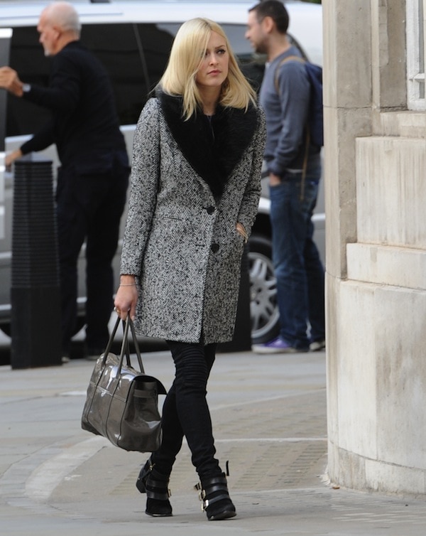 Fearne Cotton looking fabulous and ready for winter in a wool coat with a faux-fur collar, skinny jeans, and buckled ankle boots