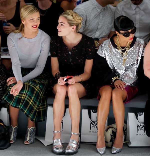 Model Kyleigh Kuhn, DJ and actress Chelsea Leyland, and singer-songwriter Natalia Kills sporting interesting shoes while attending the Milly presentation