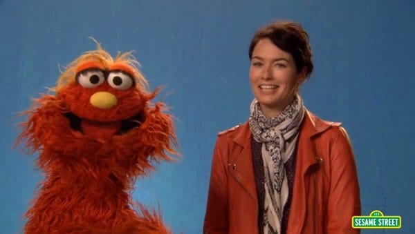Lena Headey looks elegant in a chic black-and-white scarf on Sesame Street