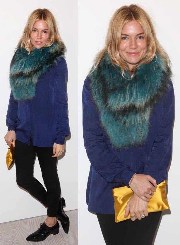 Sienna Miller grounds her front-row look with glossy black lace-up flats, letting the polished menswear-inspired shoes balance the softness of her teal Charlotte Simone fur scarf, blue blouse, and skinny trousers at Matthew Williamson’s Spring 2014 London Fashion Week presentation