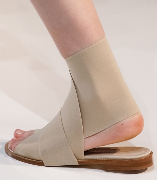 The always sleek and minimal Victoria Beckham sticking to her style aesthetic with pointy mules and clean fuss-free bandage sandals for Spring 2014