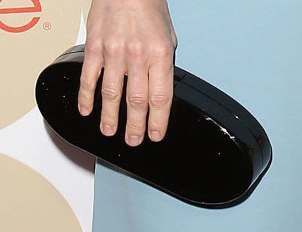 Anna Faris accessorized her Giulietta dress with a sleek black Edie Parker clutch