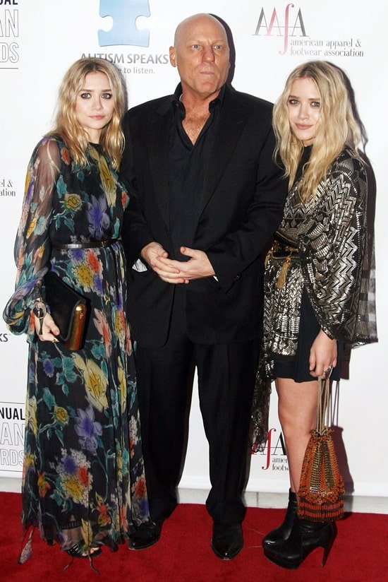 Ashley Olsen, Steve Madden, and Mary-Kate Olsen attend the 32nd Annual AAFA American Image Awards at the Grand Hyatt Hotel in New York City on May 26, 2010, with Mary-Kate in black platform ankle boots and Ashley finishing her look in sleek black sandals