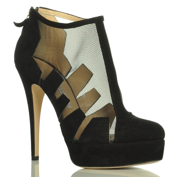 A dramatic black suede and mesh Bionda Castana "Belen" ankle bootie featuring graphic cutout panels, a concealed platform, and a sky-high stiletto heel for a bold, architectural finish