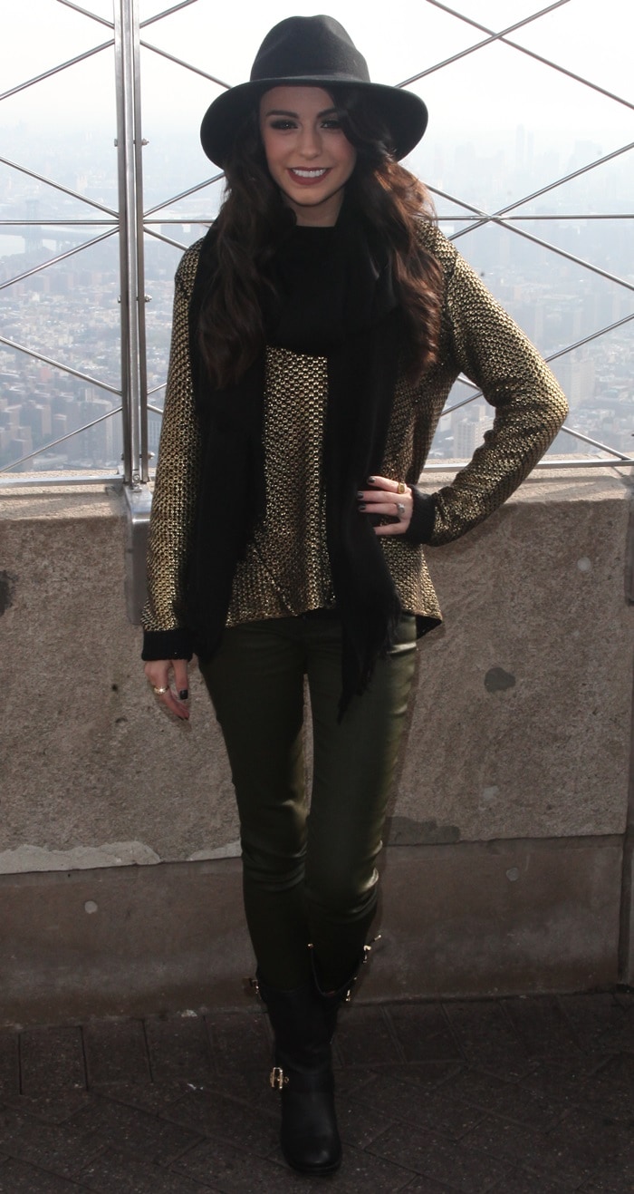 Cher Lloyd paired a&nbsp;metallic bronze sweater with dark green leather pants