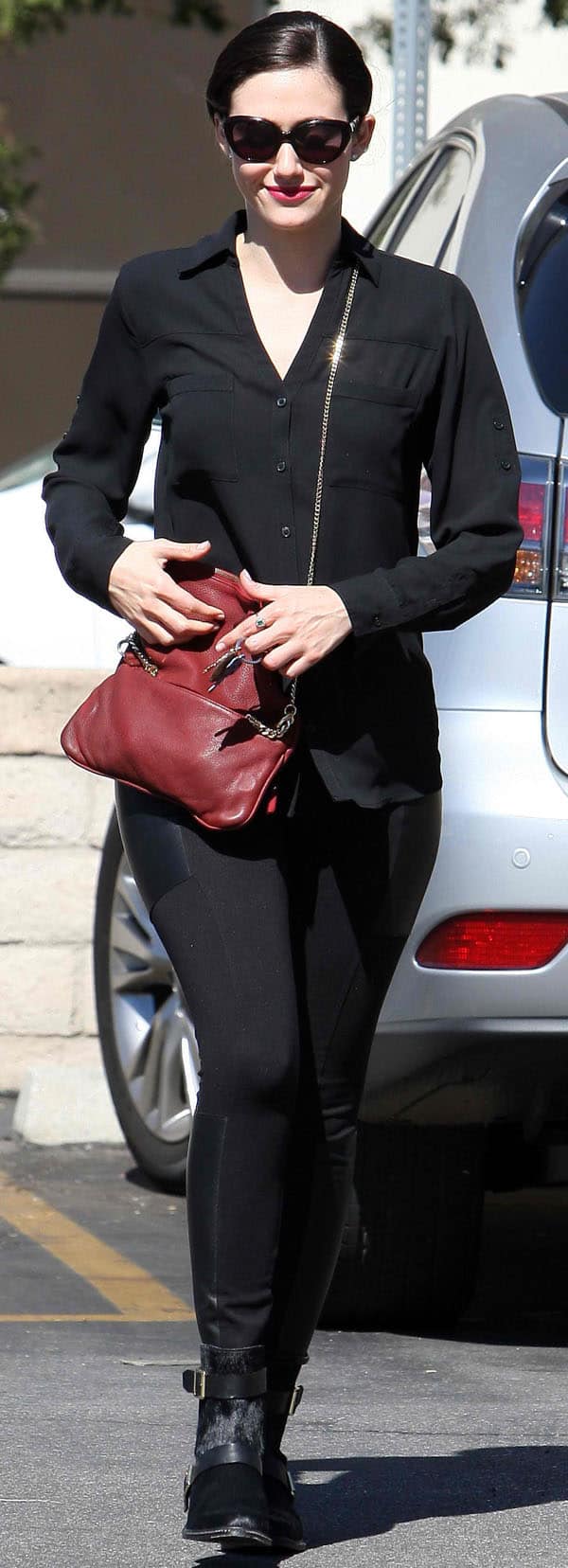 Emmy Rossum styled her leggings with Rachel Zoe Collection boots and a Zadig Voltaire bag