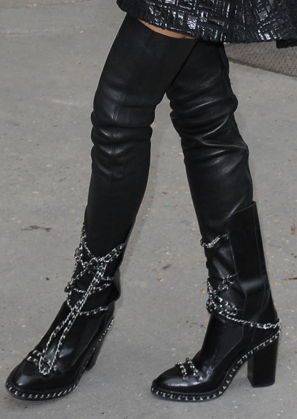 Leigh Lezark's leather boots with chain detailing from Chanel's Fall 2013 collection