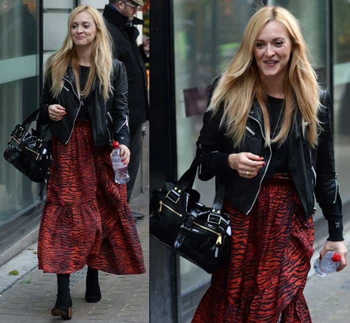 Fearne Cotton effortlessly mixes edgy and bold, pairing a red tiger-print maxi dress with a classic black leather jacket and sleek ankle boots