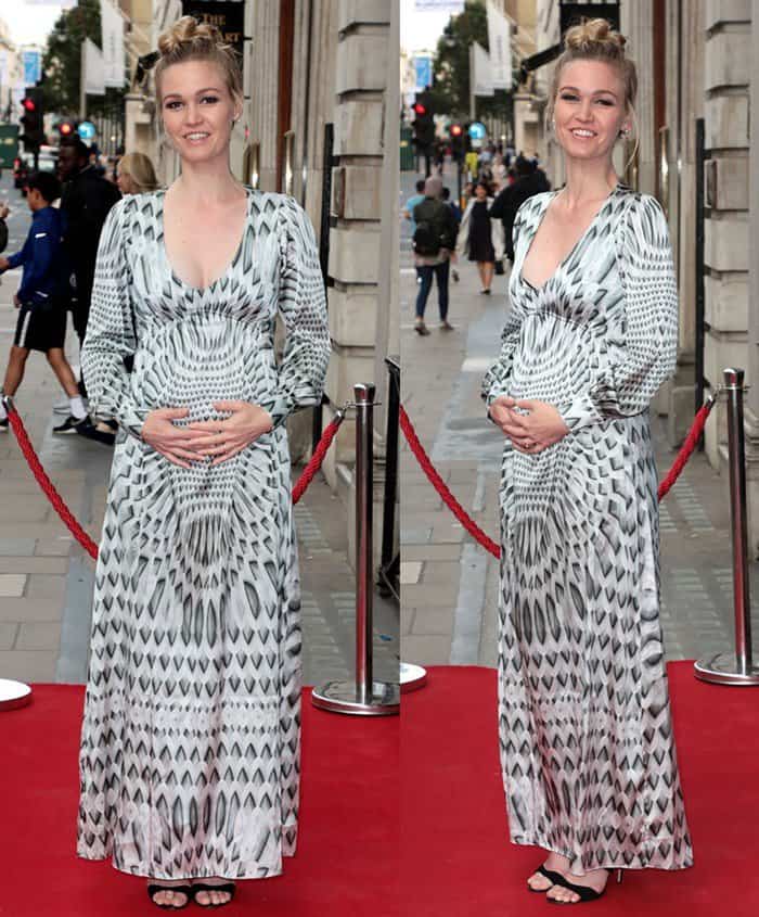 Julia Stiles looked radiant in a patterned long-sleeve maxi dress, finishing her maternity-chic look with simple black strappy sandals