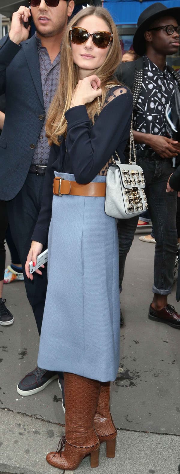 Adding a touch of sparkle, Olivia Palermo carries a white Chloé Elsie crystal-embellished bag