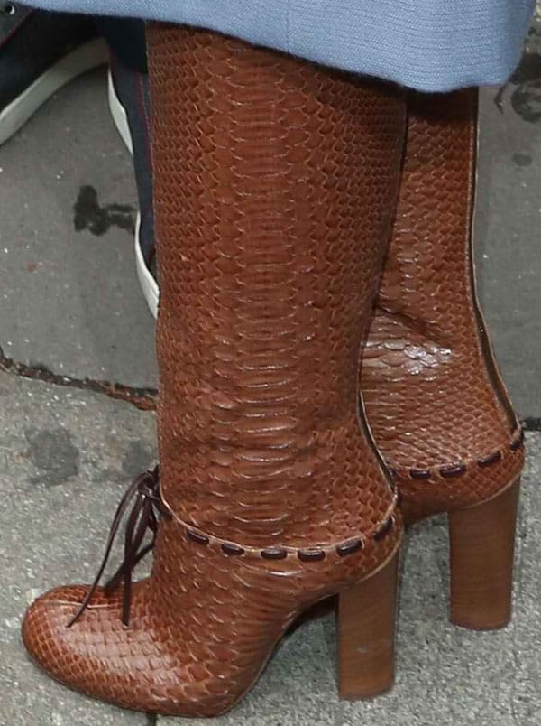 Showcasing the luxurious texture, these are Olivia Palermo's Chloé python knee boots, complete with a practical back zip
