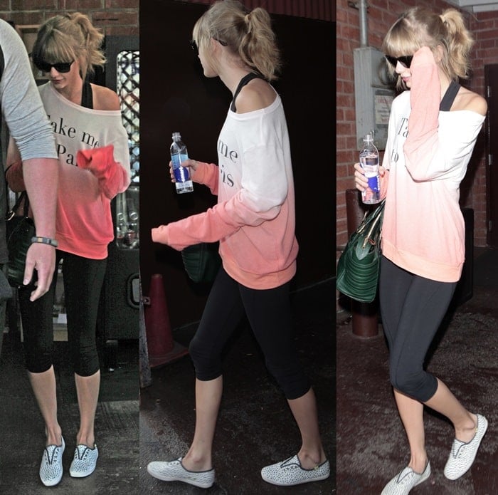 Taylor Swift styled her graphic sweatshirt with cropped yoga pants
