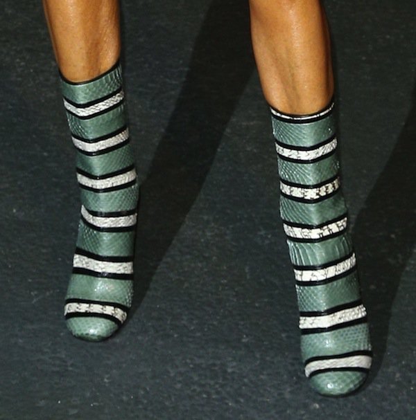 Anna Dello Russo wearing Givenchy tricolor snakeskin boots at the Givenchy Spring/Summer 2014 show during Paris Fashion Week