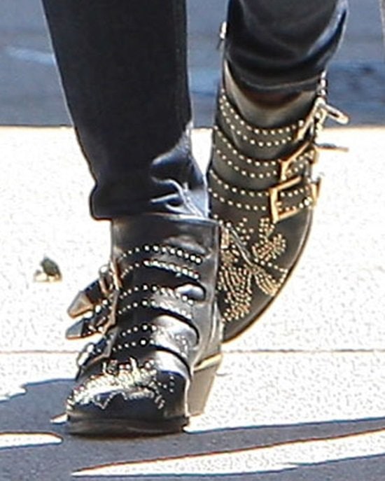 A close-up view of the studded buckled boots worn by Ashley Greene in Studio City