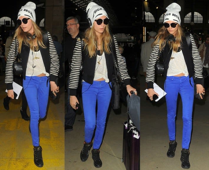 Cara Delevingne was spotted in Paris on September 29, 2013, wearing AG Adriano Goldschmied the Stilt cigarette jeans in brilliant blue and Mulberry leather and suede high-top sneakers