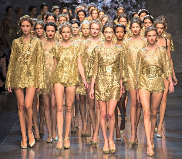 Models in head-to-toe gold at the finale for Dolce Gabbana’s Spring/Summer 2014 ready-to-wear collection fashion show