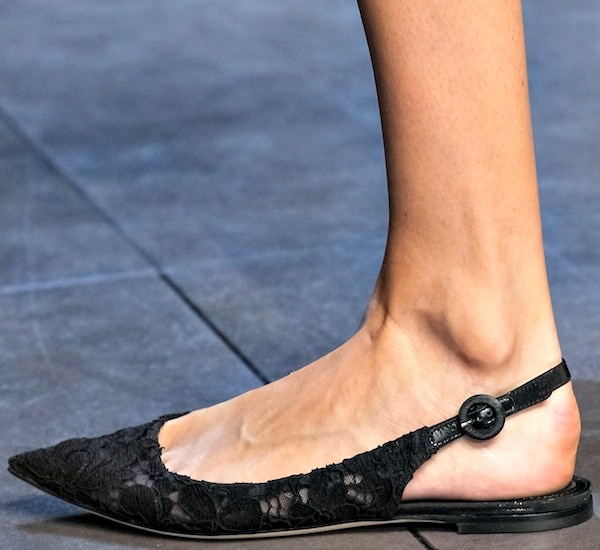 Black Dolce Gabbana flat slingback shoes with a lace overlay and a pointed toe